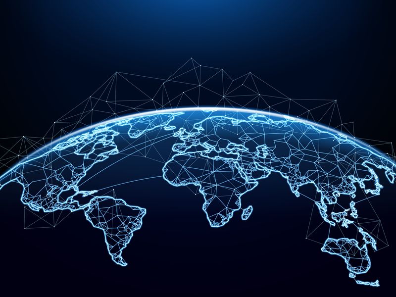 Global network map with glowing blue continents and digital connections