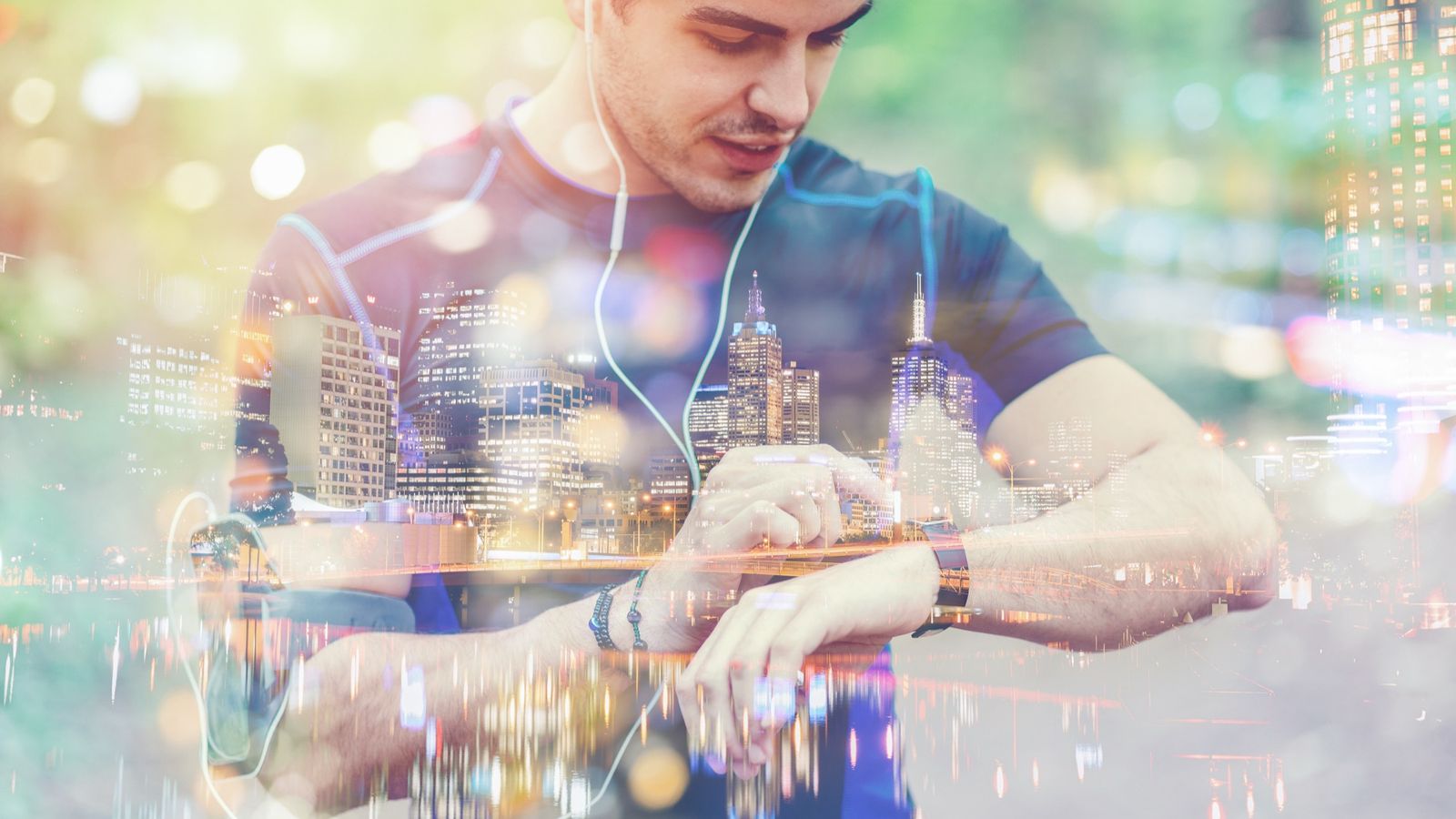 Double-exposure image of a runner checking a fitness wristwatch overlaid with a city skyline, representing connected health data