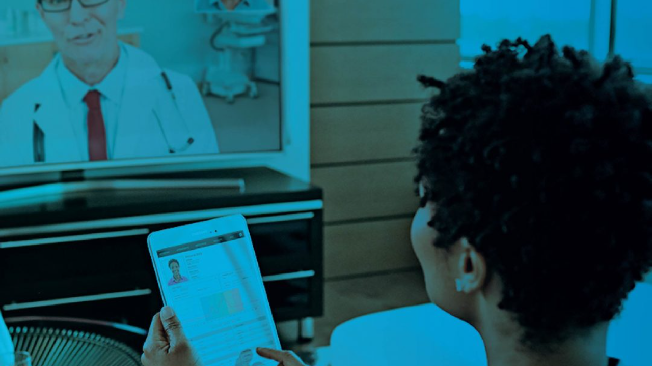 Woman having a telehealth video consultation with a doctor on a tablet at home, with a teal overlay.